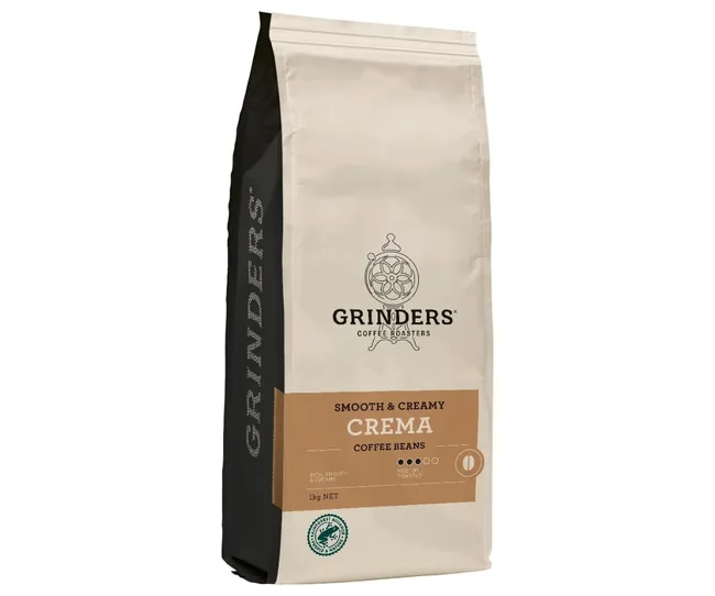 Bag of Grinders Crema coffee beans labeled "Smooth & Creamy," medium roasted, 1kg package.