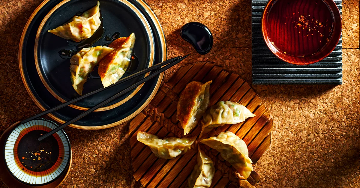 Crisp Pork and Ginger Gyozas with Sesame Rayu