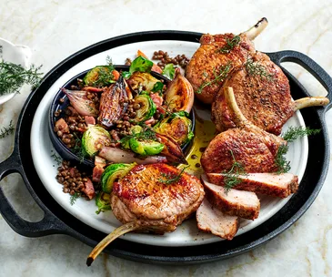 Sumac-spiced pork cutlets with Brussels sprouts and lentils