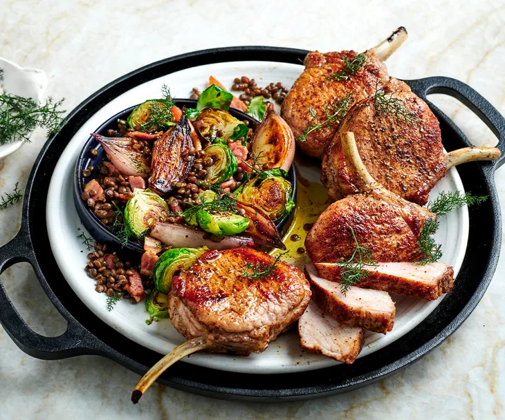 Sumac-spiced pork cutlets with Brussels sprouts and lentils