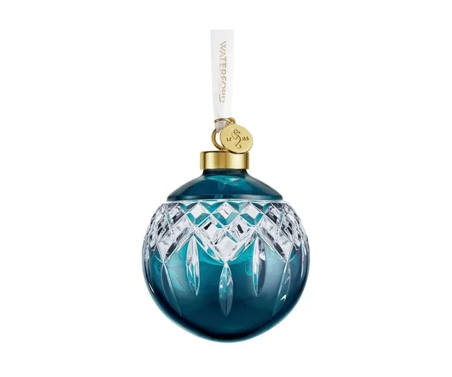 Blue and clear crystal Waterford ornament with golden top and ribbon for hanging.