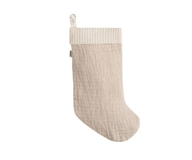 Cream-colored quilted Christmas stocking with ribbed cuff and hanging loop.