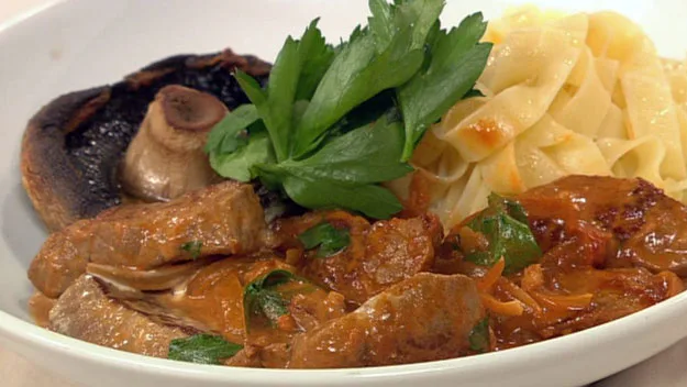 Veal stroganoff with buttered noodles