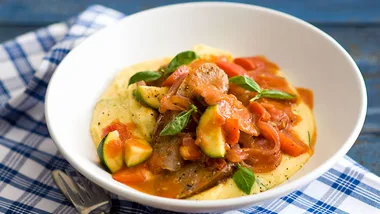Sausages ratatouille with quick cheesy polenta