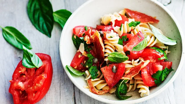 Pasta salad with tomato and crisp prosciutto