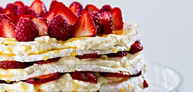 Layered fresh strawberry meringue cake