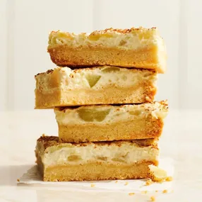 stacked slices of apple sour cream slice