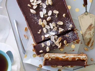 Nougat, salted peanut caramel & milk chocolate tart