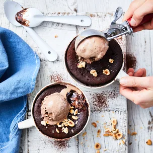 Chocolate hazelnut mug puddings served with chocolate icecream
