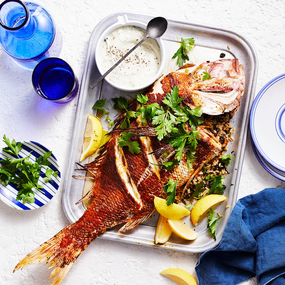 Roast whole fish with rice & lemon