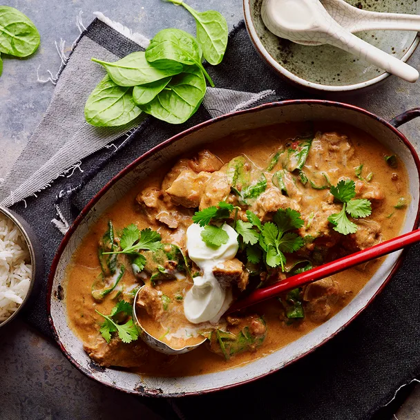 Slow cooked pepper pork curry with side of rice