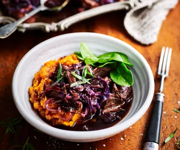 Mulled wine pork casserole with red cabbage and kūmara mash