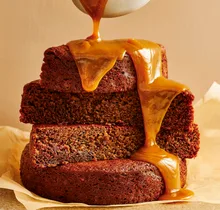 Sticky date pudding with miso caramel sauce poured over the top