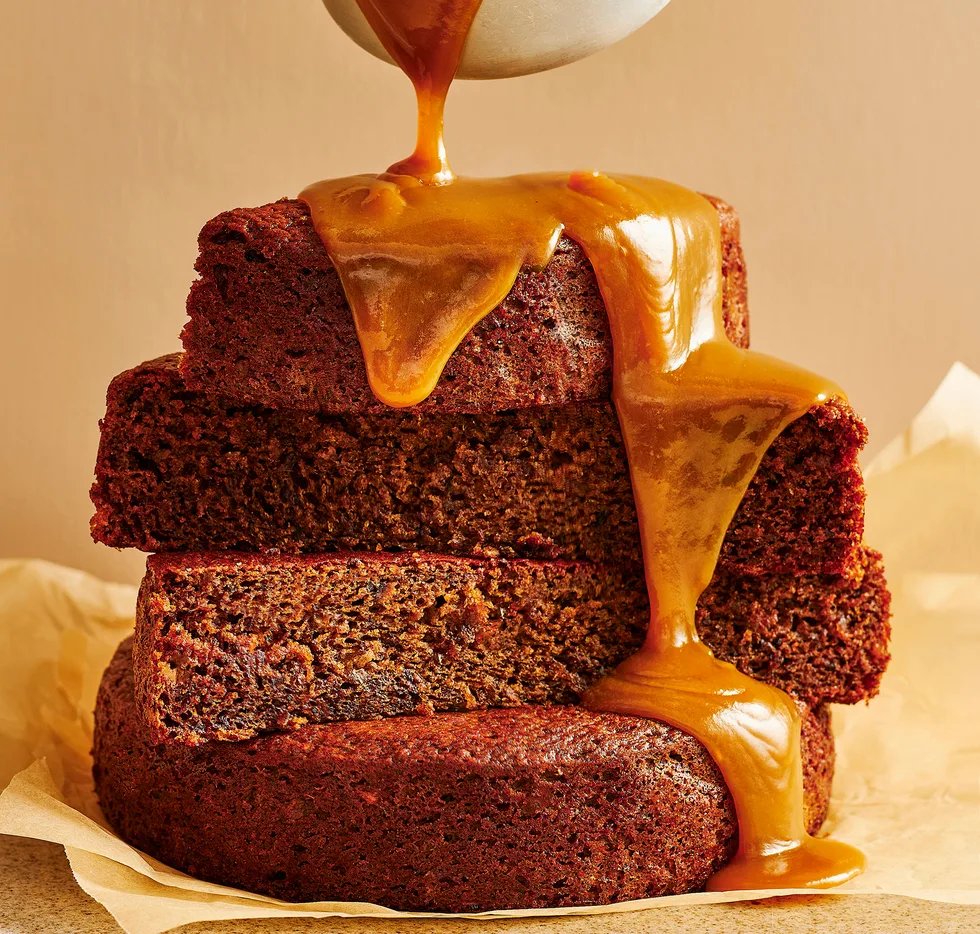 Sticky date pudding with miso caramel sauce poured over the top