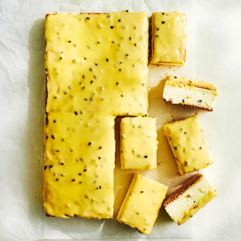 rectangle shaped passionfruit cheesecake cut into slices