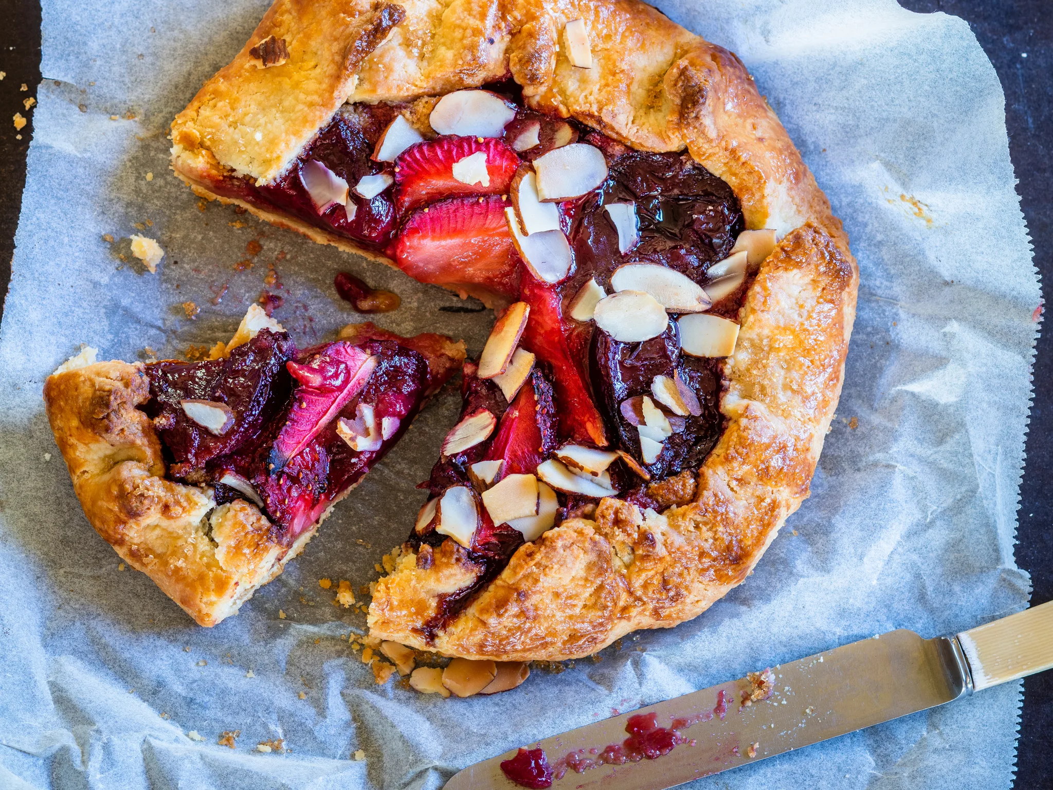 Rustic plum and strawberry crostata