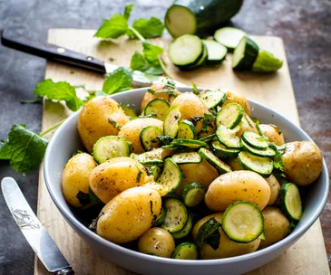 Buttery potatoes and minted courgettes