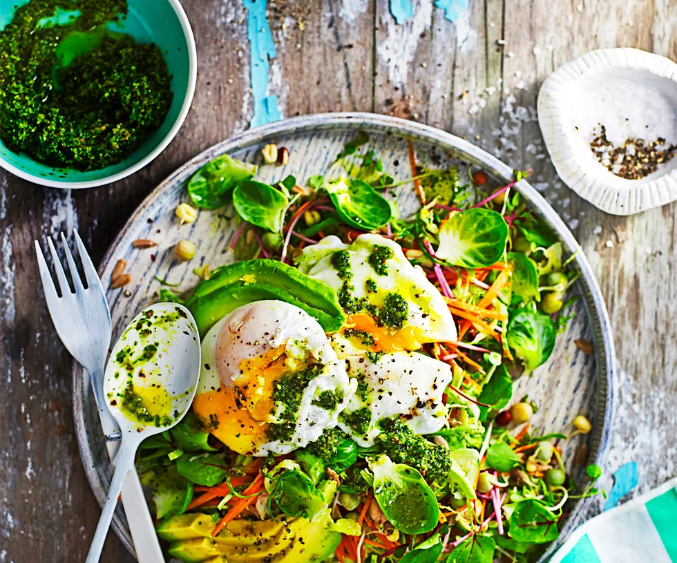 Breakfast salad with poached egg and kale pesto