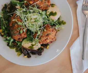 The Shack's chickpea and corn fritters with salsa and chipotle crema