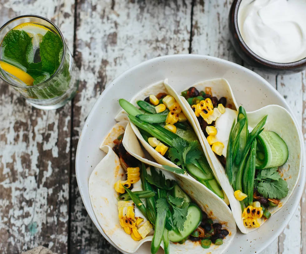 Chipotle bean tacos with pickled green beans and cucumber