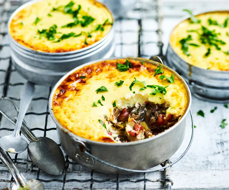 Eggplant and tomato pies with cheesy yoghurt tops
