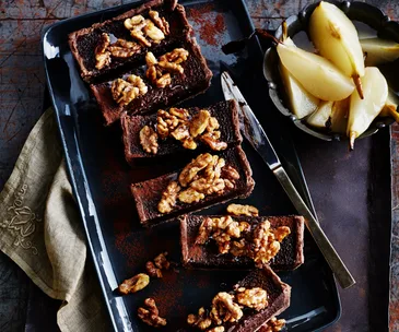 Rich dark chocolate tart with poached pears