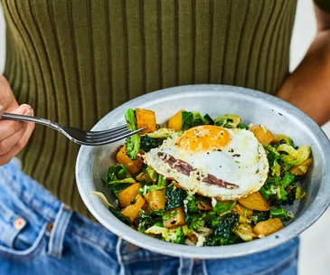 Winter greens with fried egg, anchovy and parmesan