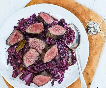 Venison with blackberry and wine-braised cabbage