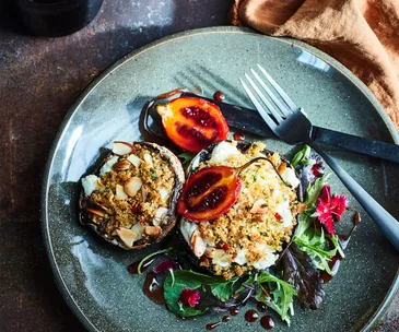 Roasted portobellos with goat’s cheese, chilli garlic crumble & balsamic tamarillos
