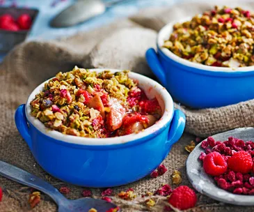 Ginger pear and pistachio crumbles in ramekins