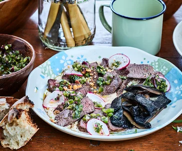 Venison with hummus and green salsa