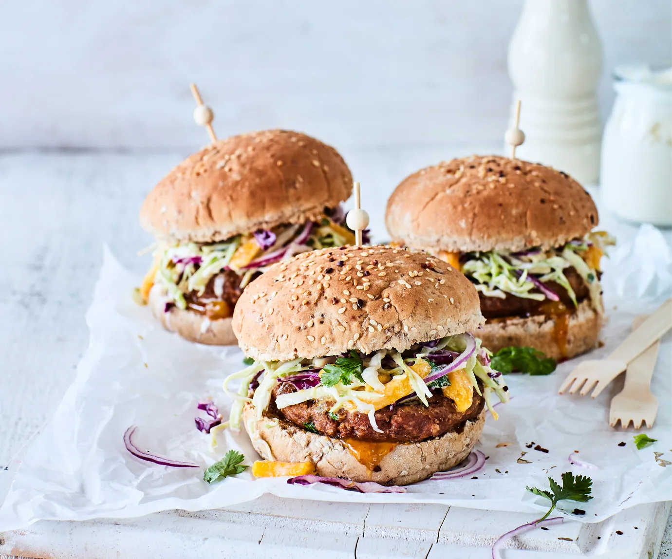Spicy lemongrass pork burgers with mango slaw