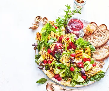 Raspberry and honey-baked haloumi salad