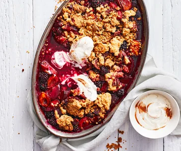 Plum and blackberry crumble with spiced yoghurt