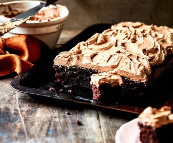 Fudgy dark chocolate sheet cake with milk chocolate mousse frosting