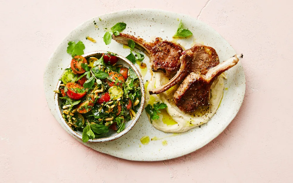 BBQ lamb cutlets with hummus and a mint & almond tabbouleh