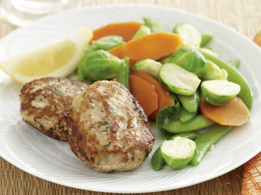 Herbed chicken patties with buttered vegies