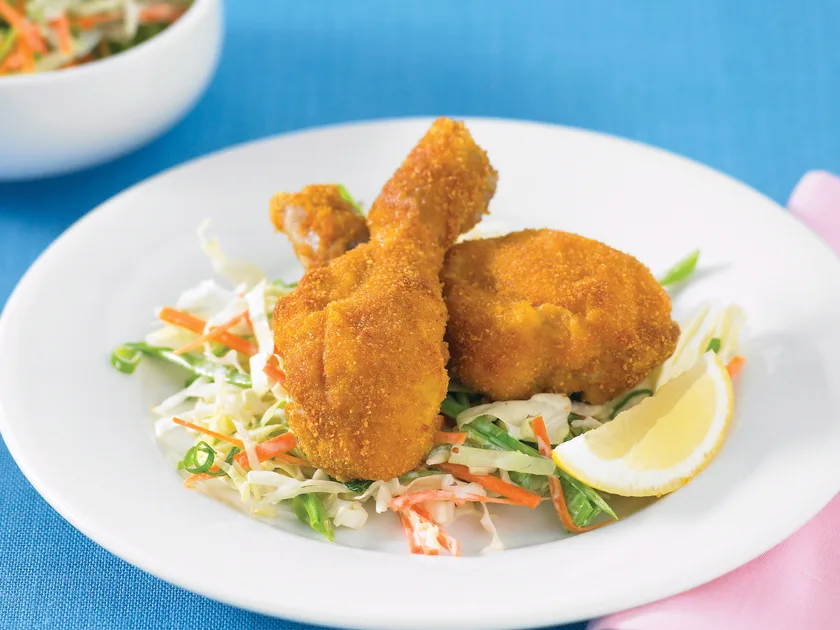 Crumbed chicken and coleslaw
