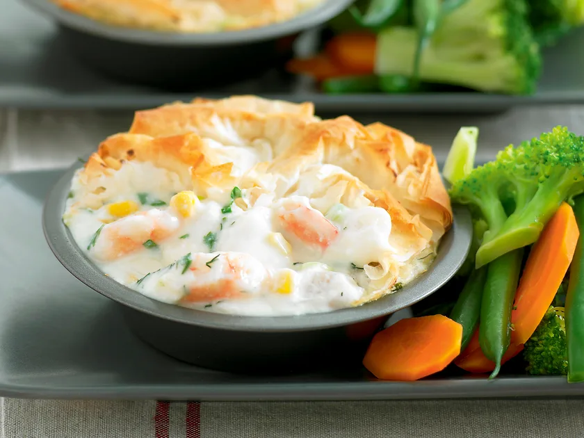 Creamy fish and herb pies
