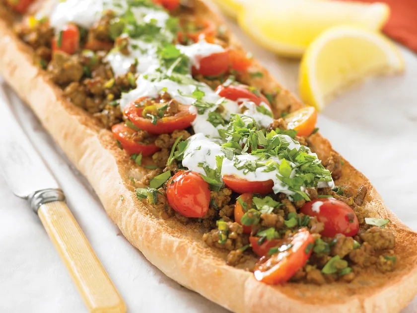 Spicy lamb pide with yoghurt