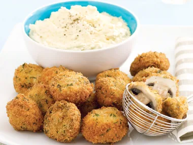Crumbed mushrooms with olive dip
