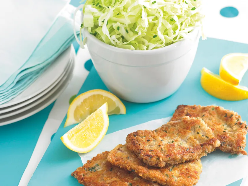 Beef schnitzel with lemon and cabbage slaw