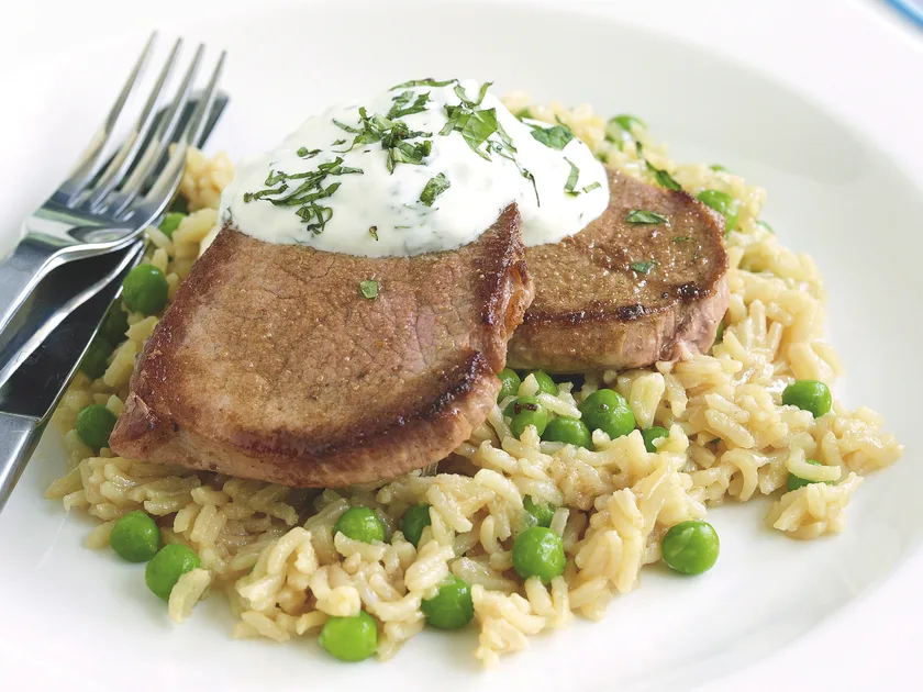 Steak with pea pilaf