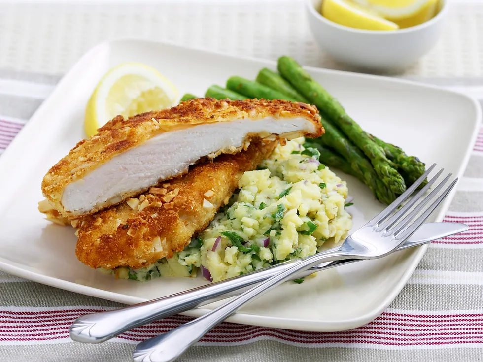 Almond crumbed chicken with crushed kipflers