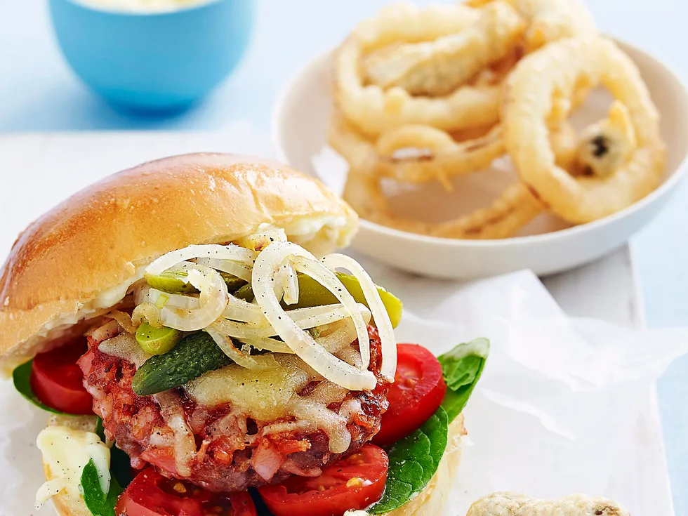 50/50 slider with fried cornichons and onion rings