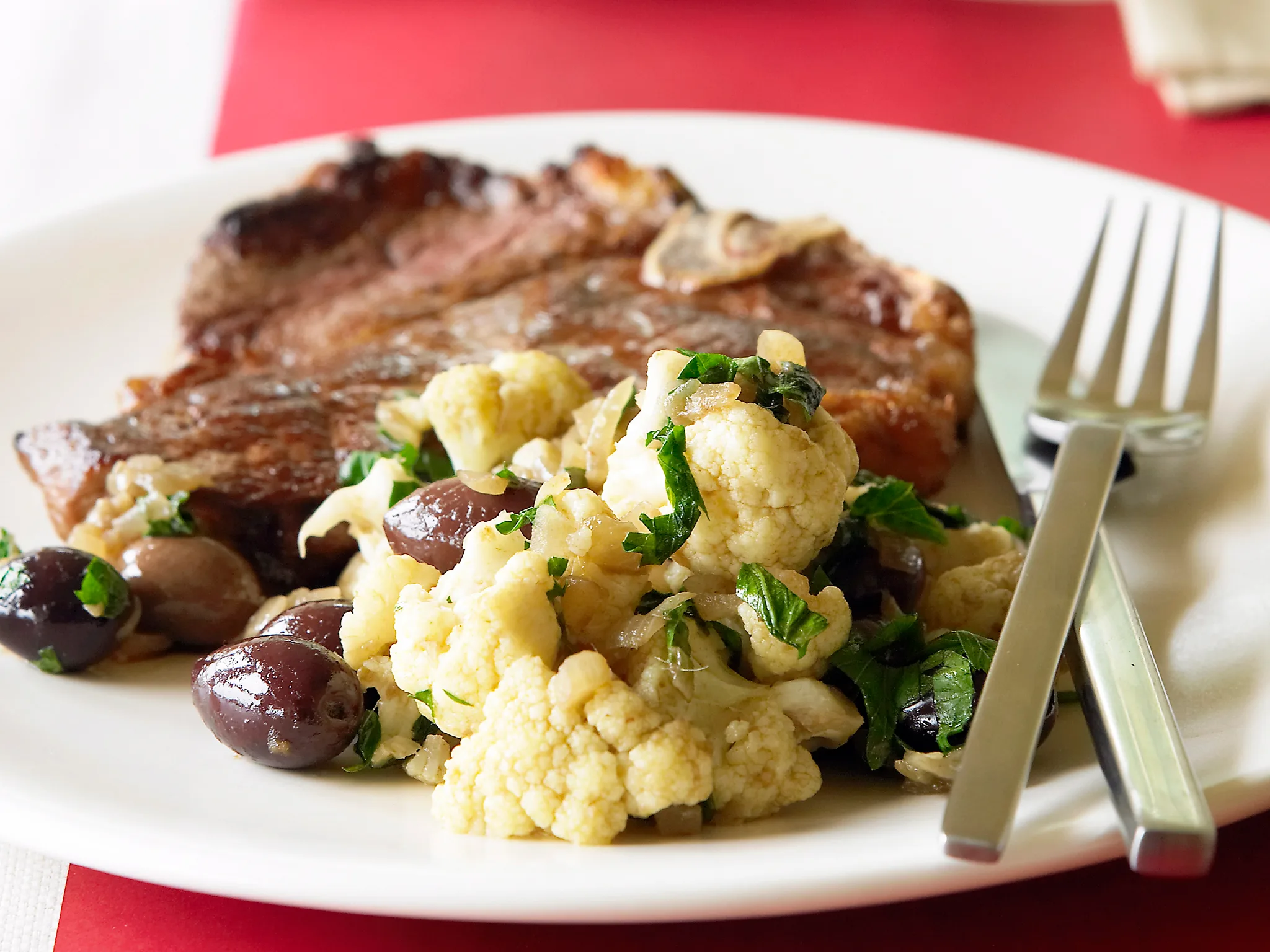 Anchovy and parsley cauliflower with steaks