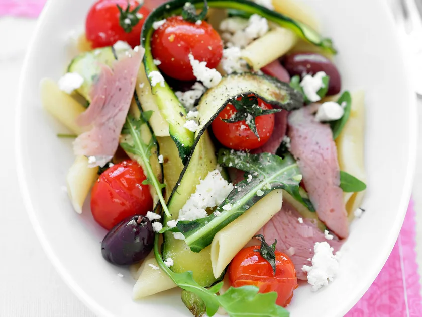 Pasta with ham, zucchini and olives