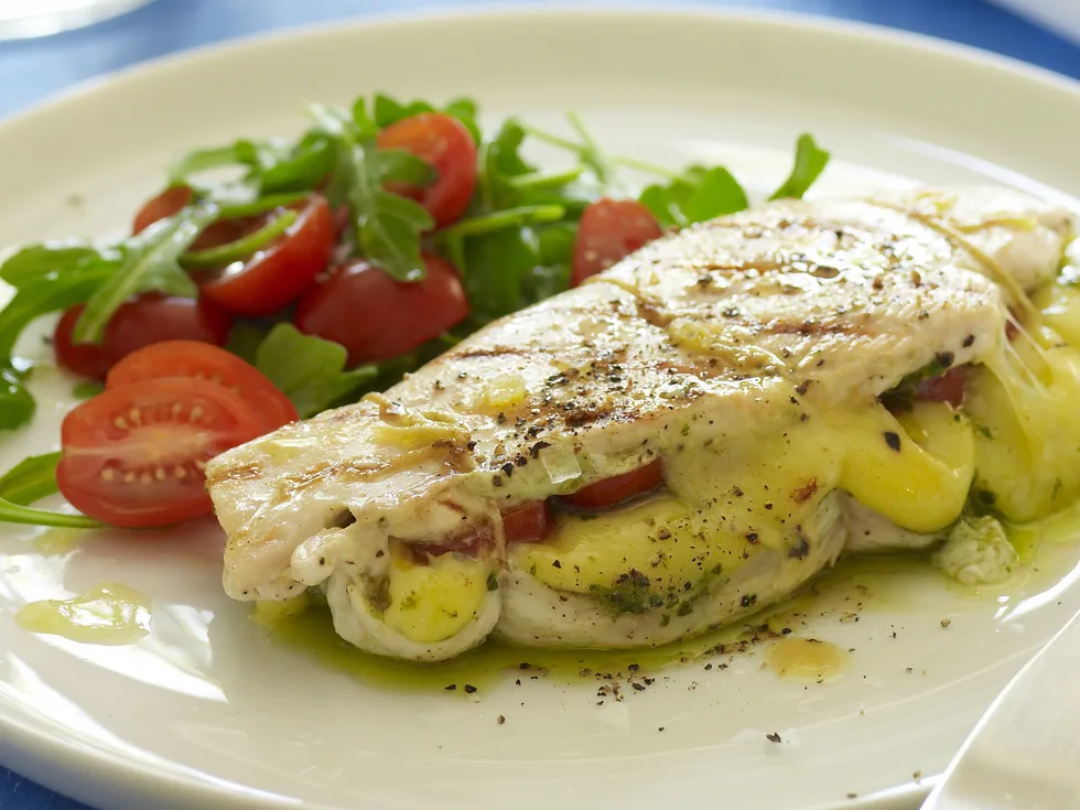 Mozzarella and pesto stuffed chicken breast
