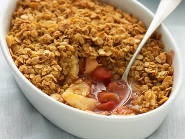 Pear and rhubarb crumble with almond and oat topping