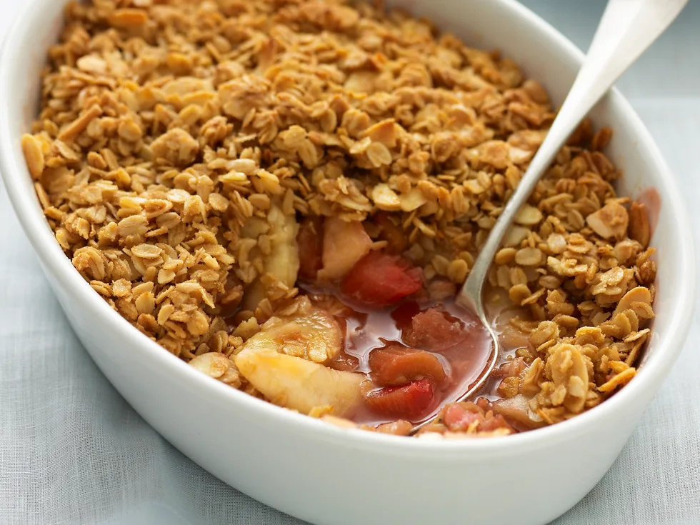 Pear and rhubarb crumble with almond and oat topping